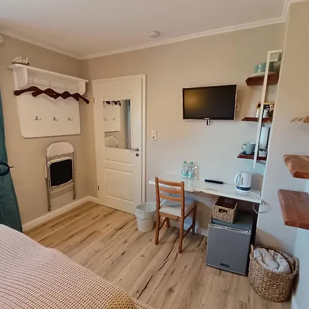 Alloggio in famiglia Nordseezimmer Koje - Wlan, Parkplatz, Eigenes Bad, Fahrradschuppen, Rollladen *